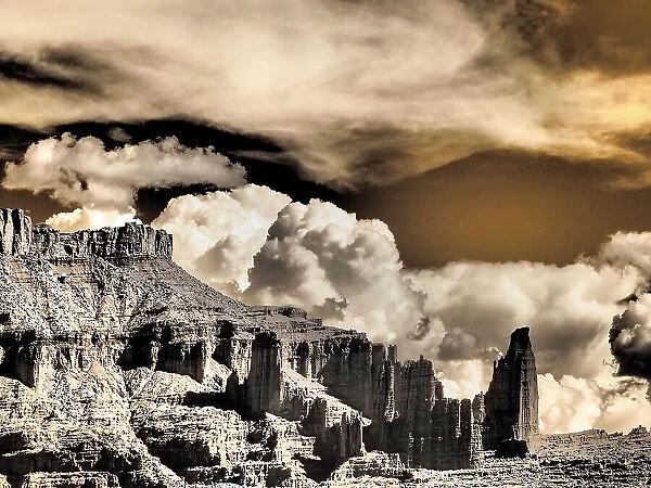 USA, Utah. Infrared of Fisher Towers with large clouds