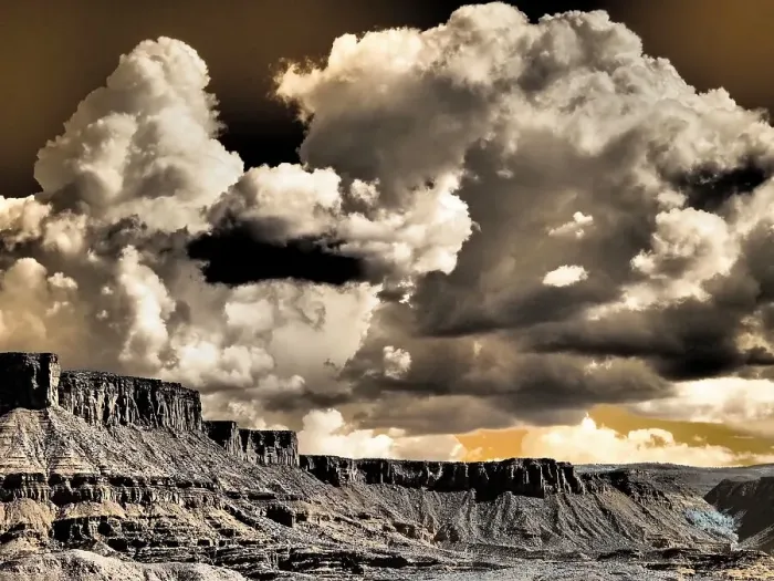Framed Print : USA, Utah. Infrared of Fisher Towers with large clouds