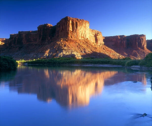 USA; Utah; A mesa reflecting in the Colorado River in Canyonlands National Park