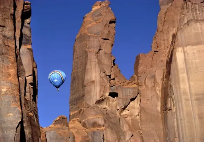 Framed Print : USA, Utah, Monument Valley. A hot-air balloon is suspended in Monument Valley, Utah Framed Print : USA, Utah, Monument Valley. A hot-air balloon is suspended in Monument Valley, Utah