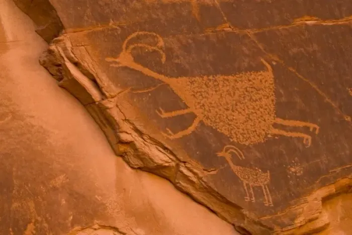 Framed Print : USA, Utah, Monument Valley National Park. Close-up of an ancient petroglyph etching on rock face Framed Print : USA, Utah, Monument Valley National Park. Close-up of an ancient petroglyph etching on rock face