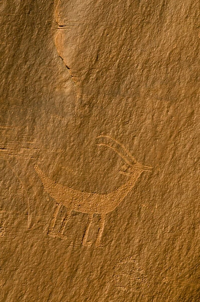 USA, Utah, Monument Valley Navajo Tribal Park. Petroglyphs on stone wall. Credit as