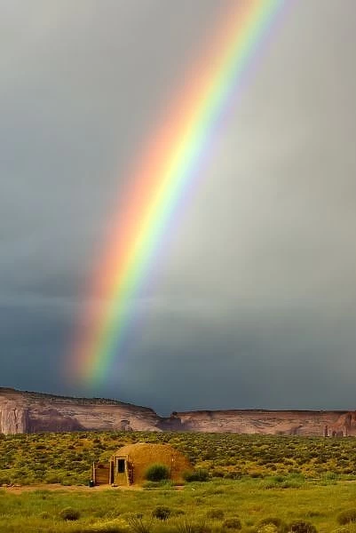 USA, Utah, Monument Valley Navajo Tribal Park. Rainbow over a Navajo hogan