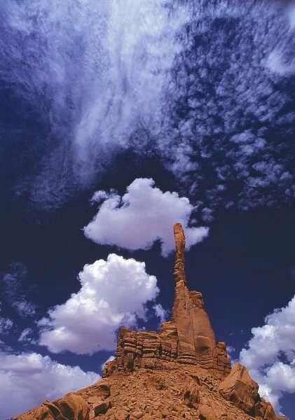 USA, Utah, Monument Valley. The Yei-bi-chai rock formation reaches to the sky in Monument Valley
