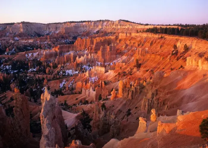 Framed Print : USA, Utah, Sun setting on Bryce Canyon, with snow clinging to the red cliffs