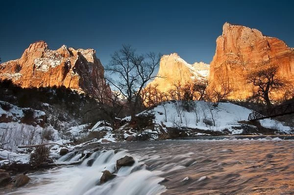 USA, Utah, Zion National Park. Mountain sunrise by the North Fork Virgin River, winter