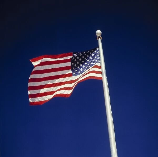 USA, Utah, Zion NP. The American flag flies above Zion National Park Headquarters, Utah