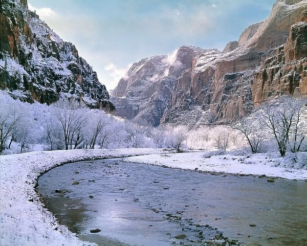 USA, Utah, Zion NP. New snow covers the canyon walls near the Virgin River in Zion National Park