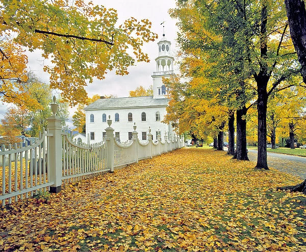 USA, Vermont, Bennington. Amidst fallen fall foliage stands this lovely white church in Bennington