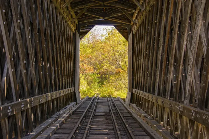 Framed Print : USA, Vermont, Fall foliage seen off Rt. 15, Wolcott, Fisher Covered Railroad Bridge (1908), Lamoille County