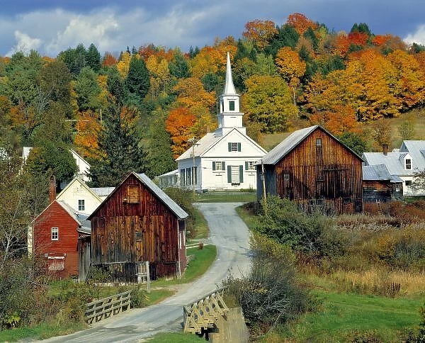 USA, Vermont, Waits River. Fall foliage adds further beauty to the small village