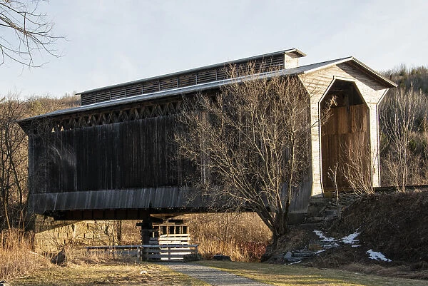 USA, Vermont, Wolcott on Rt. 15 between Morrisville and Joes Pond, covered RR bridge over Lamoille River