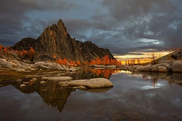 USA, WA, Alpine Lakes WIlderness Enchantments. Prusik Peak is reflected in Gnome Tarn at sunrise