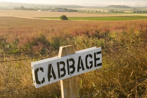 USA, WA, Island County, Whidbey Island. Helpful signage in farm fields of Ebey s