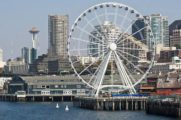 USA, WA, Seattle. Dramatic downtown waterfront includes iconic Space Needle and Seattle