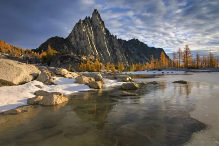 Framed Print : USA, Washington, Cascade Mountains. Prusik Peak from frozen Gnome Tarn in the Enchantment Lakes Framed Print : USA, Washington, Cascade Mountains. Prusik Peak from frozen Gnome Tarn in the Enchantment Lakes