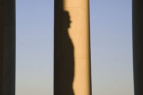 USA, Washington, D. C. The shadow of Thomas Jefferson on a column inside the Jefferson Memorial