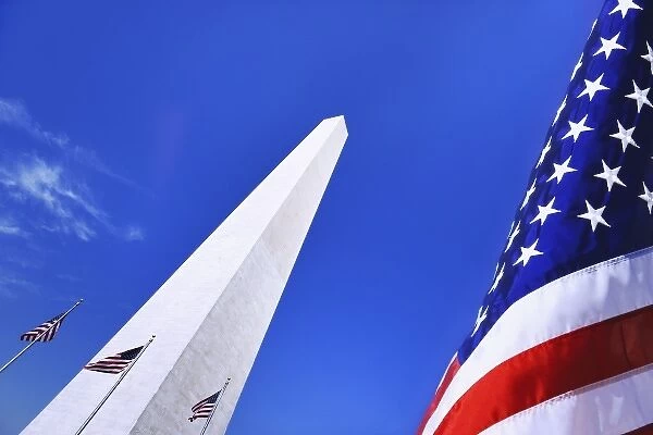 USA, Washington, DC. Digital composite of Washington Monument and the American flag