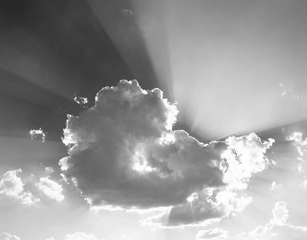 USA, Washington. God rays stream from behind cloud. Credit as