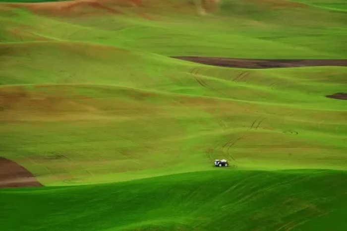 Framed Print : USA, Washington, Palouse. A watering truck works the wheat fields in Washington s Framed Print : USA, Washington, Palouse. A watering truck works the wheat fields in Washington s