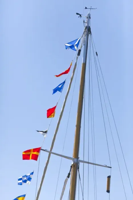 Framed Print : USA, Washington, Port Townsend. Sailboat mast flying semaphore flags at a Wooden Boat Show Framed Print : USA, Washington, Port Townsend. Sailboat mast flying semaphore flags at a Wooden Boat Show