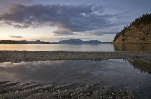 USA, Washington, San Juan Islands. Sunset on the quiet shores of Spencer Spit State