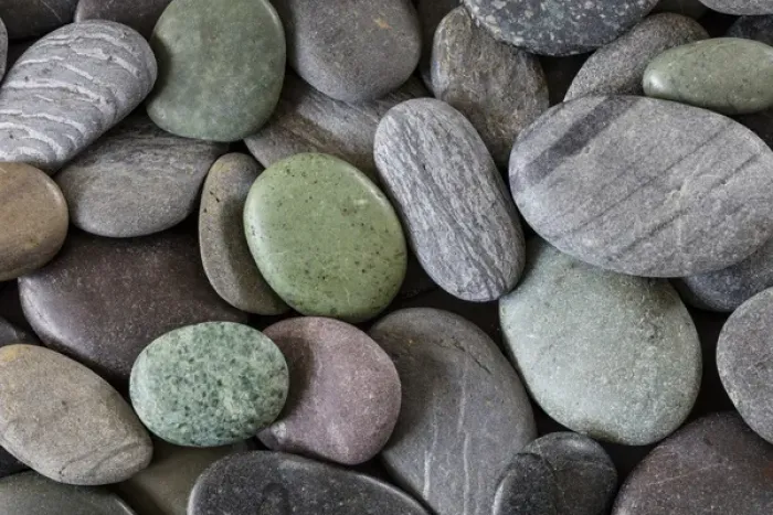 Framed Print : USA, Washington, Seabeck. Smooth beach rocks