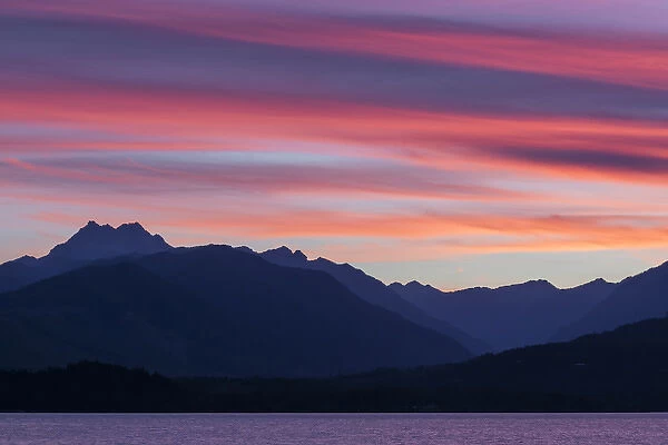 USA, Washington, Seabeck. Sunset over the Olympic Mountains and Hood Canal. Credit as