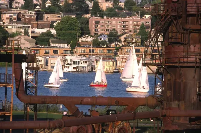 Framed Print : USA, Washington, Seattle. Sailboats on Lake Union pass rusty gas conversion relics Framed Print : USA, Washington, Seattle. Sailboats on Lake Union pass rusty gas conversion relics