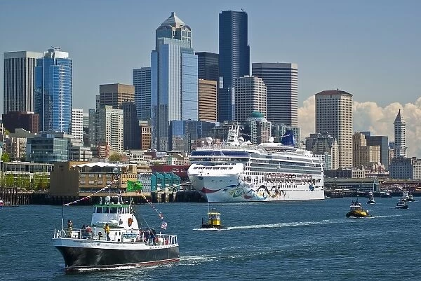 USA, Washington, Seattle. T  /  V Maritime Instructor leads tugboat parade along the