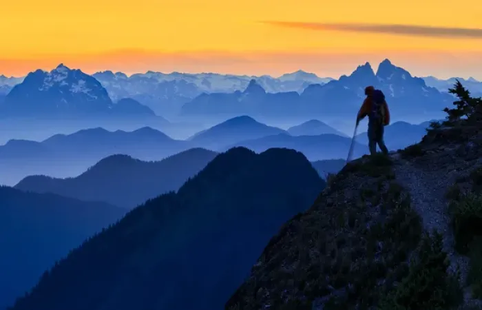 Framed Print : USA. Washington State. A backpacker decends from the Skyline Divide in the North Cascades near Mt Framed Print : USA. Washington State. A backpacker decends from the Skyline Divide in the North Cascades near Mt