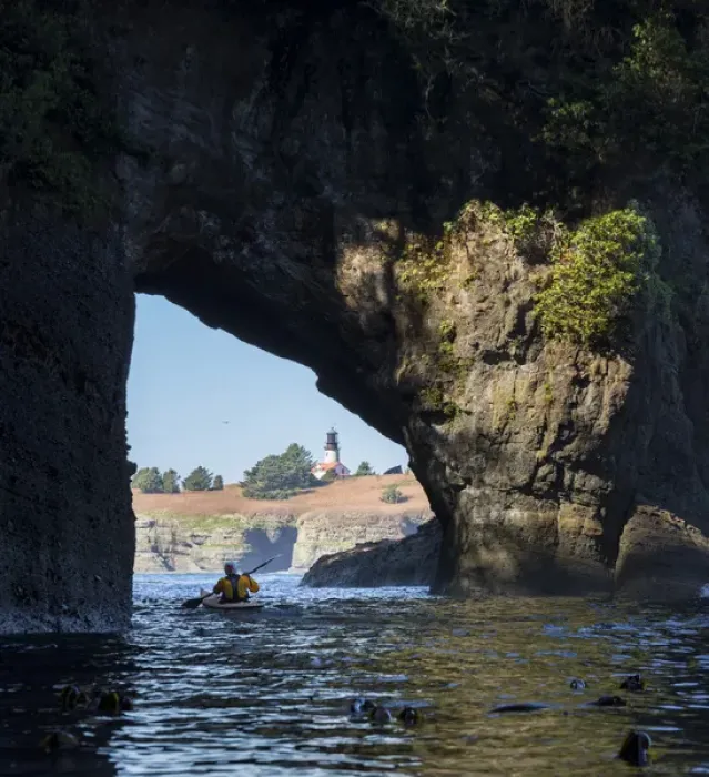 Framed Print : USA, Washington State. Male sea kayaker in archway at Cape Flattery, Olympic Coast Framed Print : USA, Washington State. Male sea kayaker in archway at Cape Flattery, Olympic Coast