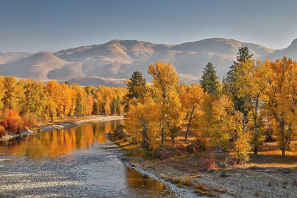 USA, Washington State, Methow Valley and river edged in Fall colored trees