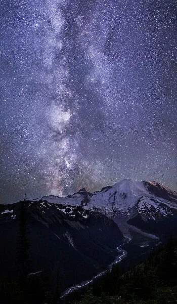 USA. Washington State. The Milky Way looms above Mt. Rainier and the White River at Mt
