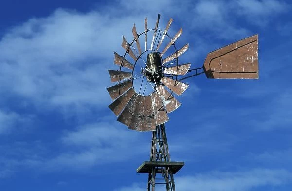 USA, Washington State, Olympic Peninsula, Dungeness Valley. Windmill against blue sky