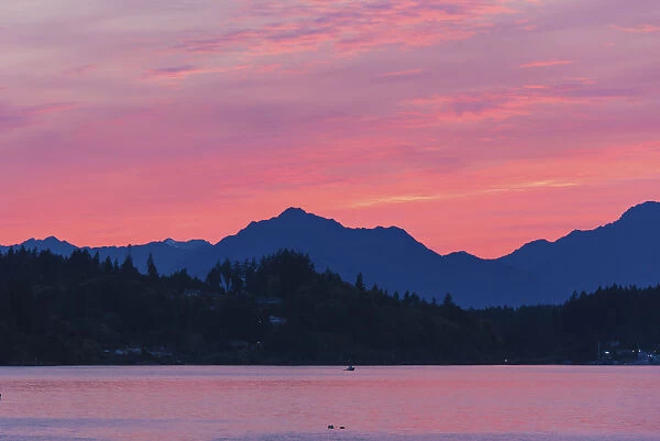 USA, Washington State, Puget Sound. Dramatic sunset over Olympic Mountains and Kitsap