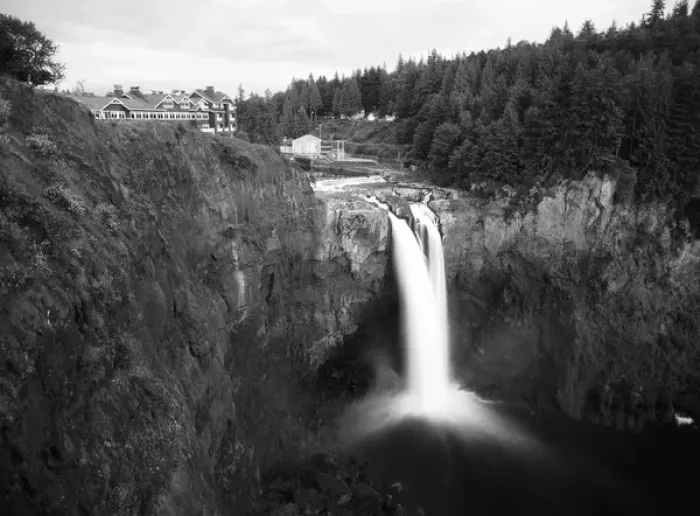 Framed Print : USA, Washington State, Salish Lodge and English Daisies overlook the 270 foot faller