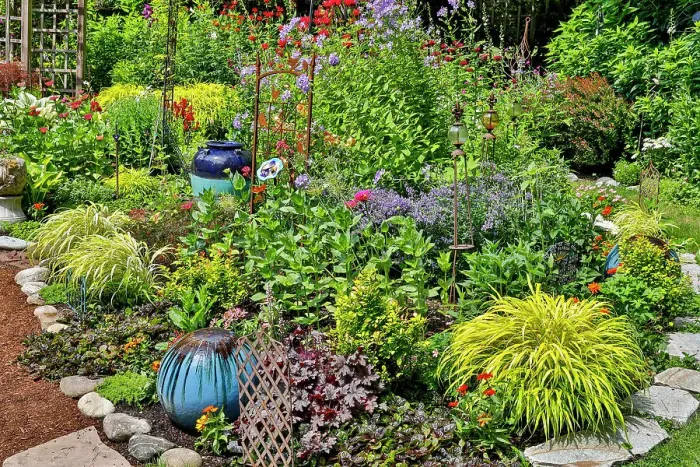 Framed Print : USA, Washington State, Sammamish. Summer perennial flower garden with cone flowers, zinnias. Beebalms, Rebecca. Coleus, Japanese grasses and lawn art Framed Print : USA, Washington State, Sammamish. Summer perennial flower garden with cone flowers, zinnias. Beebalms, Rebecca. Coleus, Japanese grasses and lawn art