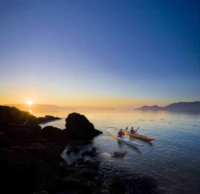 Framed Print : USA, Washington State, San Juan Islands, Doe Island. Two women kayakers at dawn. (MR) Framed Print : USA, Washington State, San Juan Islands, Doe Island. Two women kayakers at dawn. (MR)
