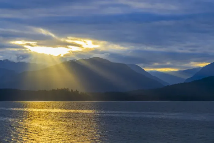 Framed Print : USA, Washington State, Seabeck. Sunburst over Hood Canal and Olympic Mountains at sunset