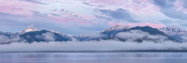 USA, Washington State, Seabeck. Composite of Hood Canal and Olympic Mountains at sunrise
