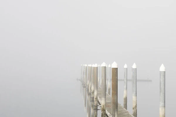USA, Washington State, Seabeck. Marina walkway in fog