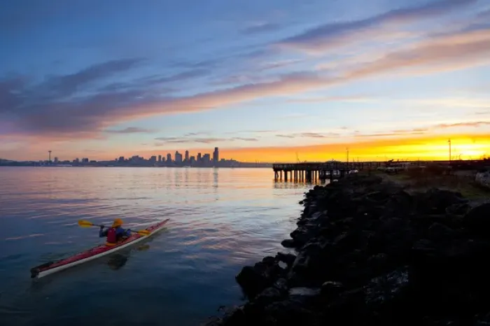 Framed Print : USA, Washington State, Seatte. Male sea kayaker in Elliot Bay, Seattle, WA at sunrise Framed Print : USA, Washington State, Seatte. Male sea kayaker in Elliot Bay, Seattle, WA at sunrise