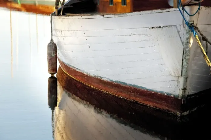 Framed Print : USA, Washington State, Seattle. Wooden boat reflects on lake
