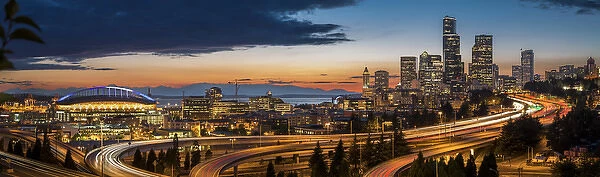 USA, Washington State, Seattle. Sweeping sunset view from Century Link Field to downtown