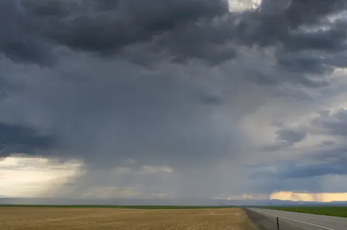 Framed Print : USA, Washington State. Storm clouds and rain ahead over the road in Central Washington