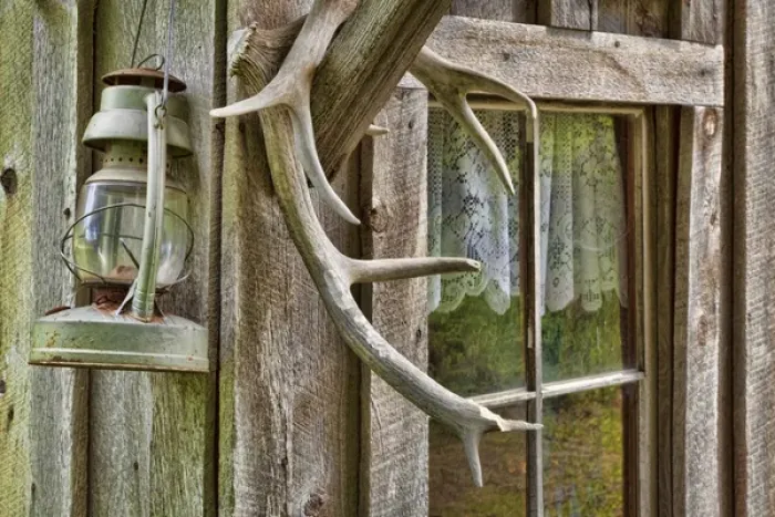 Framed Print : USA, Washington, Stehekin. Close-up of antlers and lantern hanging on Buckner Orchard and Homestead Framed Print : USA, Washington, Stehekin. Close-up of antlers and lantern hanging on Buckner Orchard and Homestead