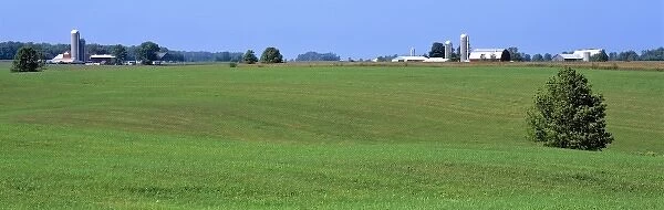 USA, Wisconsin, Kewaunee Co. Silos mark farm sites in rural Wisconsins Kewaunee County