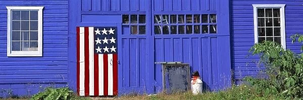 USA, Wisconsin, Kewaunee Co. A stylized American flag decorates a door on this blue