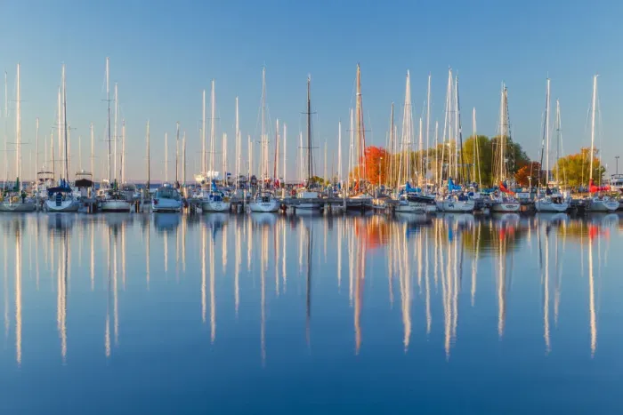 Framed Print : USA, Wisconsin. Panoramic view of Fall colors reflected on the still waters of the harbor Framed Print : USA, Wisconsin. Panoramic view of Fall colors reflected on the still waters of the harbor